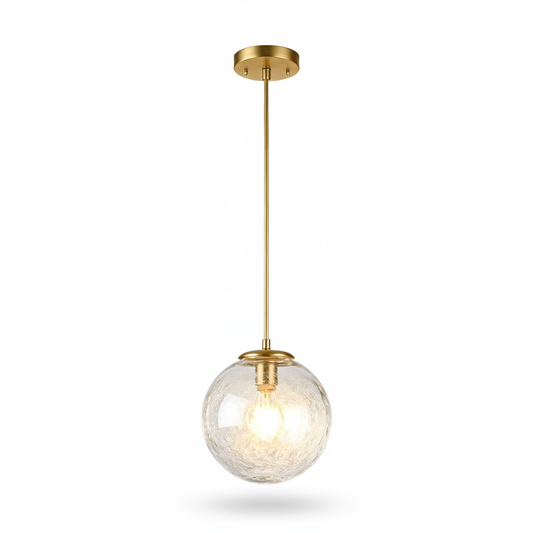 Aurelia polished brass pendant light with a clear crackled glass globe on a white background