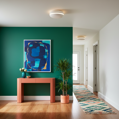 HaloDisc white flush ceiling light with warm band in a colorful hallway