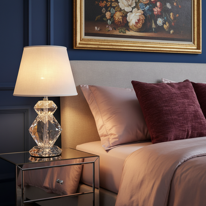 Prismelle faceted crystal table lamp glowing on a colorful bedroom nightstand
