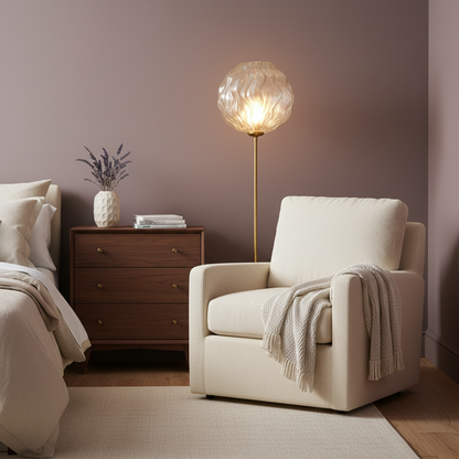 Gold-tone ripple glass globe floor lamp in an elegant bedroom corner